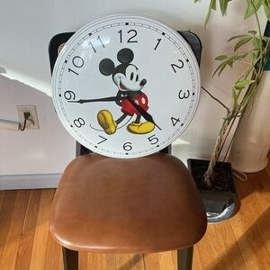 Very large Mickey Mouse wall clock. It’s metal and enamel and in perfect shape.